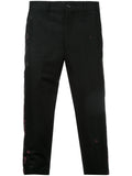 COMME DES GARÇONS Homme Plus paint splattered cropped trousers