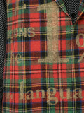 COMME DES GARÇONS deconstructed sleeveless tartan jacket