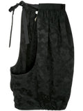 COMME DES GARÇONS cut-detail embroidered half shorts