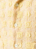 COMME DES GARÇONS textured buttoned jacket