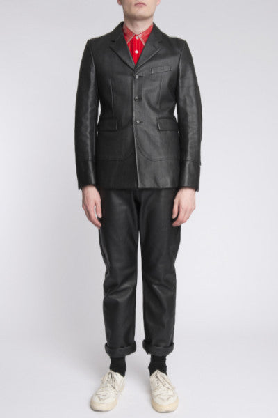 COMME des GARÇONS <br> Stiff Vinyl Suit